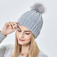 Stretchy Satin Lined Skull Knit Beanie Hat with Faux Fur Pom-Pom
